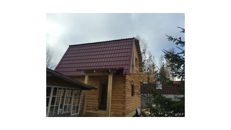 Построенный дом из бруса под усадку